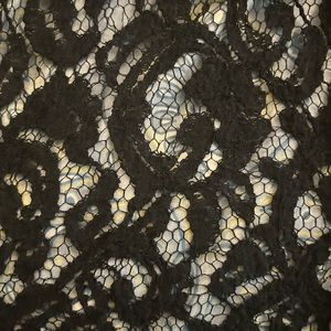 Black lace top with zipper in back. No tags. 3x